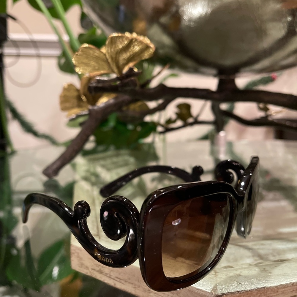 Prada baroque sunglasses with swirl on side. Pre-loved.